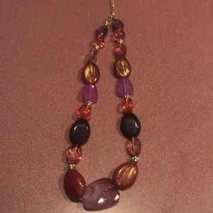 Purple plastic bead necklace with goldtone spAcers